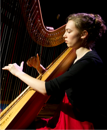 image presenting a harpist, in a web page related to music research, music technology and the YMusic search engine