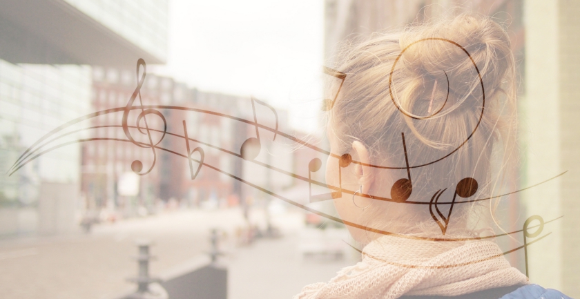 image representing a woman with musical notes, in a post related to music research, music technology and the YMusic search engine